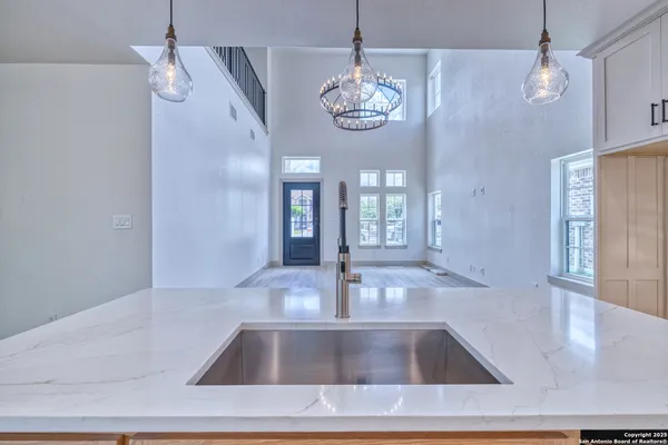 a view of kitchen and sink