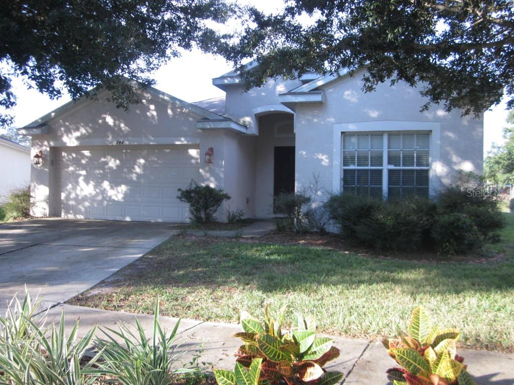 744 Star Pointe Drive Seffner, FL 33584 - Photo 1 of 1 a front view of a house with a yard