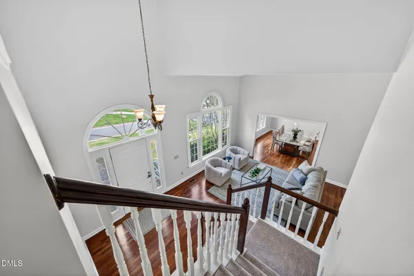 a view of a living room and bedroom