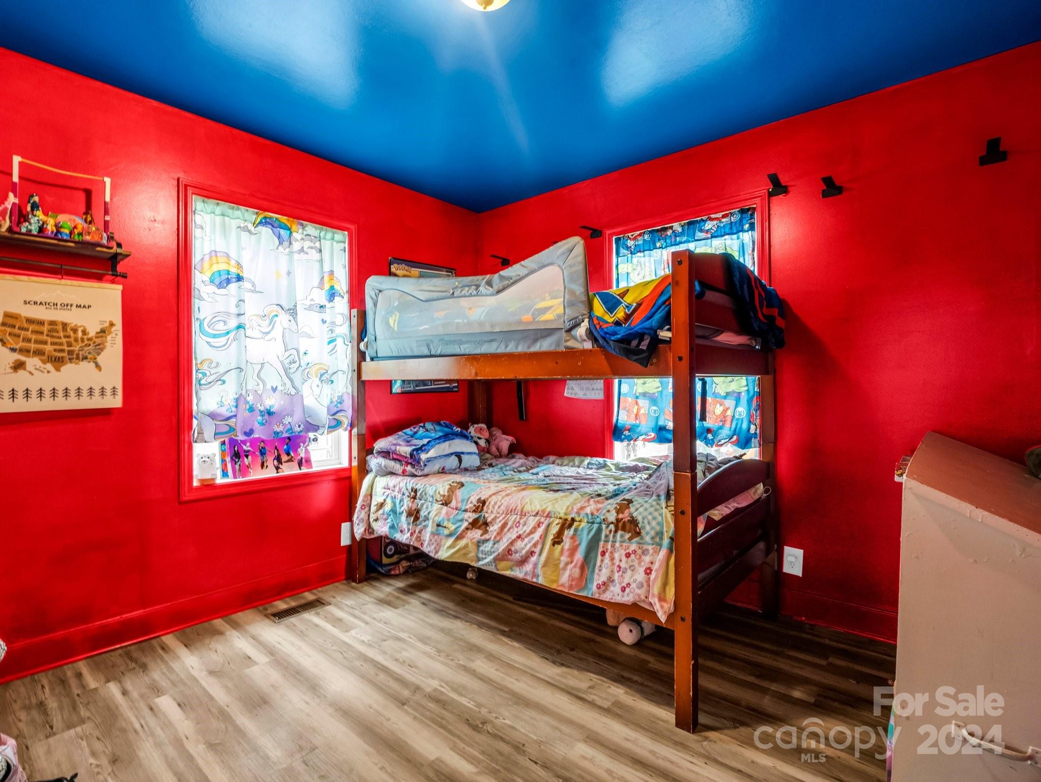 1251 Howards Creek Mill Road Vale, NC 28168 - Photo 15 of 30 a bedroom with two beds and a window