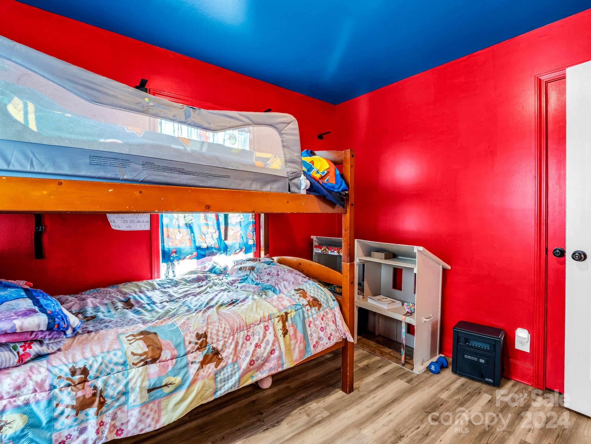 1251 Howards Creek Mill Road Vale, NC 28168 - Photo 16 of 30 a bed room with a bed and a window