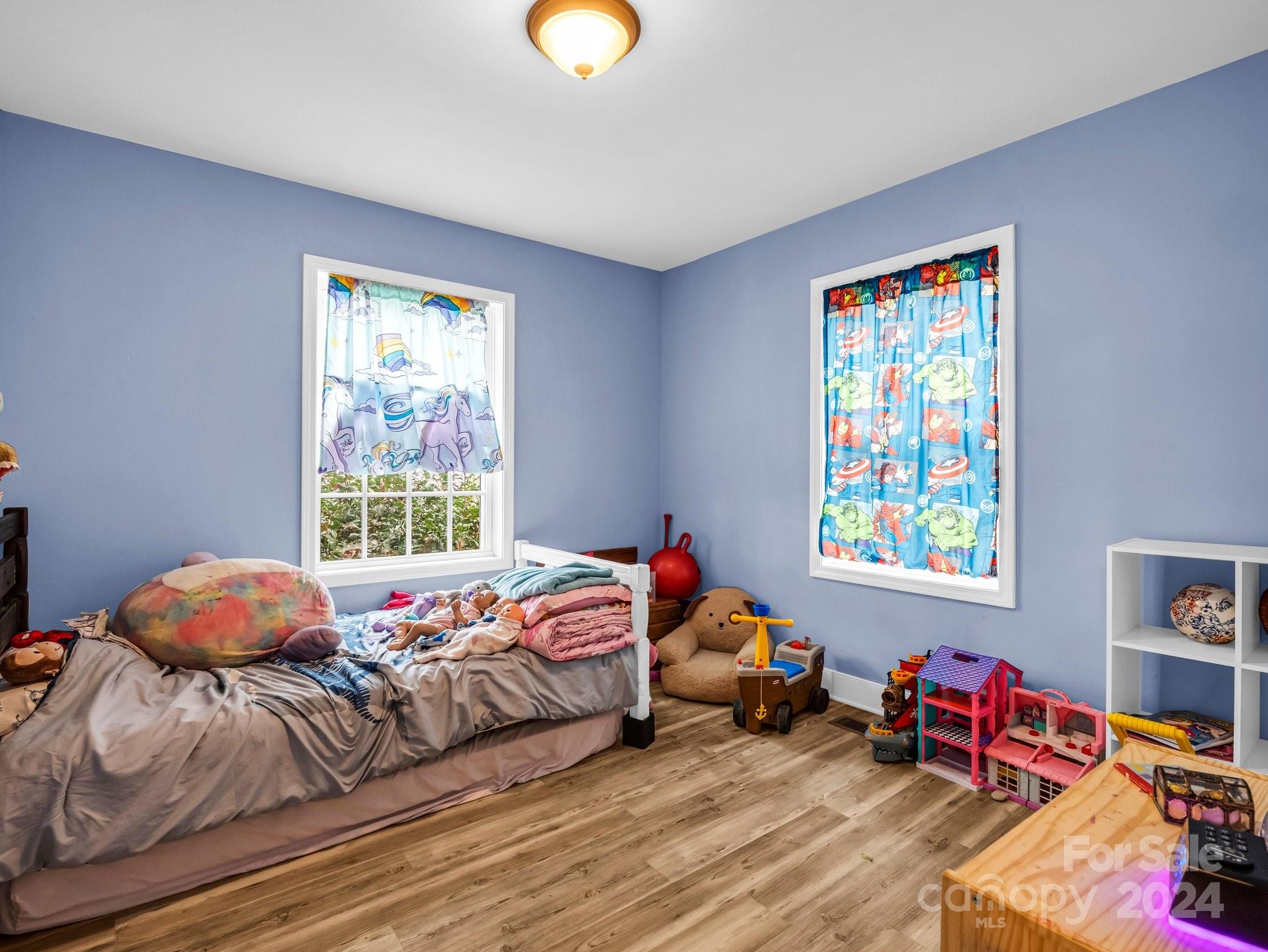 1251 Howards Creek Mill Road Vale, NC 28168 - Photo 17 of 30 a bedroom with bed and a window