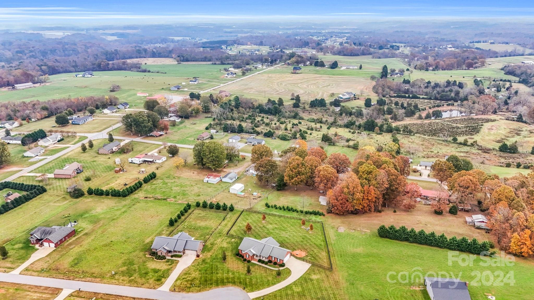 1251 Howards Creek Mill Road Vale, NC 28168 - Photo 28 of 30 an aerial view of residential houses with outdoor space