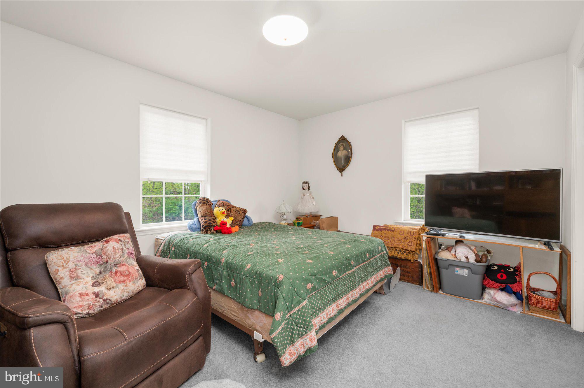 861 Dunkels Church Road Kutztown, PA 19530 - Photo 39 of 55 a bedroom with furniture and a flat screen tv