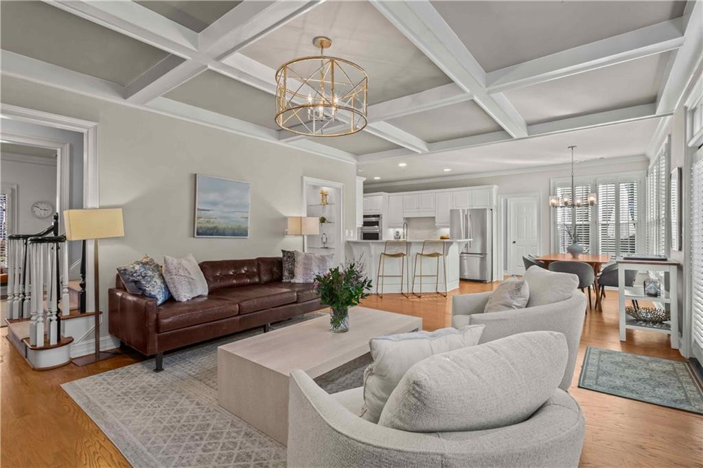 4120 Paran Pointe Drive Northwest Atlanta, GA 30327 - Photo 14 of 47 a living room with furniture and a chandelier