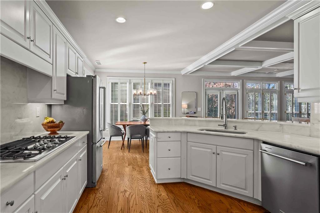 4120 Paran Pointe Drive Northwest Atlanta, GA 30327 - Photo 20 of 47 a kitchen with a sink stove and cabinets