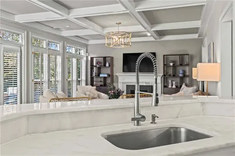 a kitchen with a sink and a window