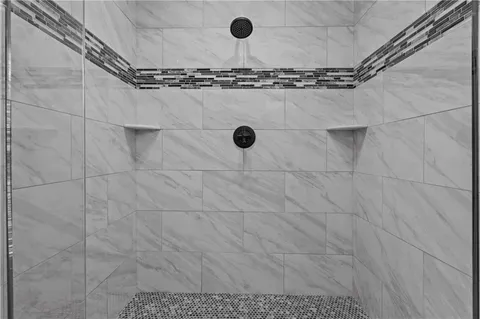 a close view of a shower in bathroom