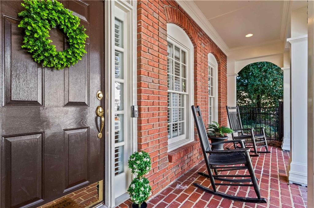 4120 Paran Pointe Drive Northwest Atlanta, GA 30327 - Photo 4 of 47 a house view with a seating space and potted plants
