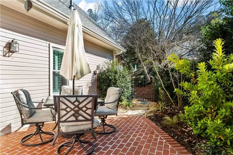 a view of chair and table in the patio