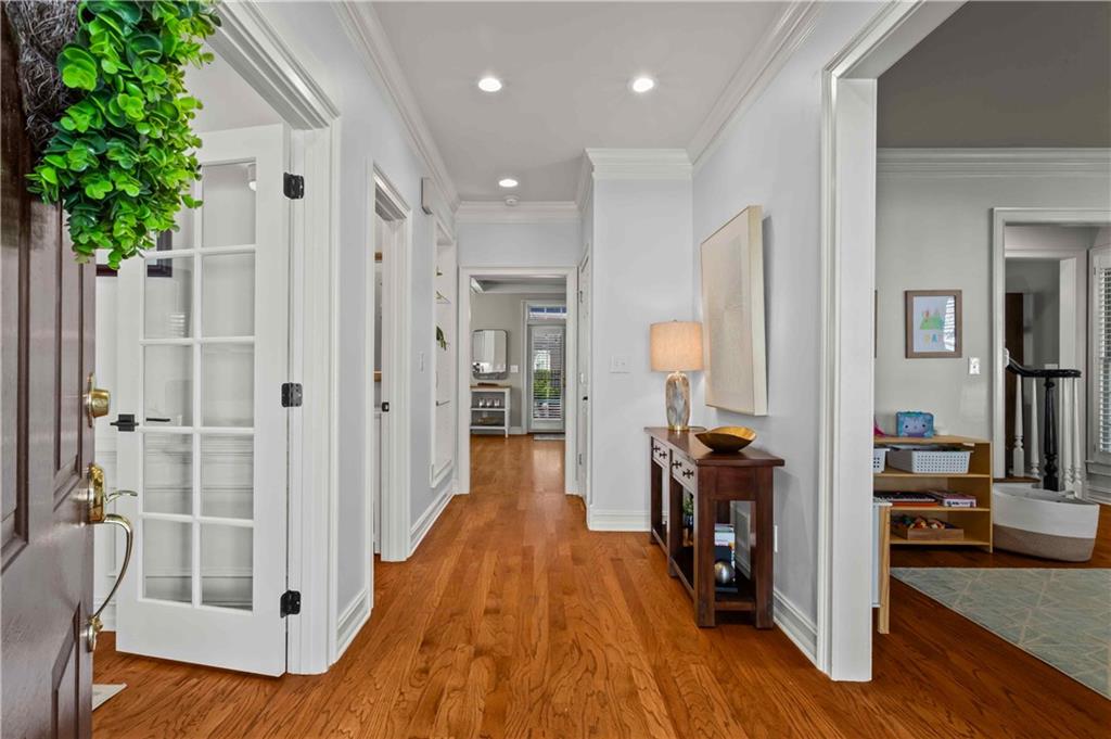 4120 Paran Pointe Drive Northwest Atlanta, GA 30327 - Photo 6 of 47 a view of a hallway with wooden floor and staircase