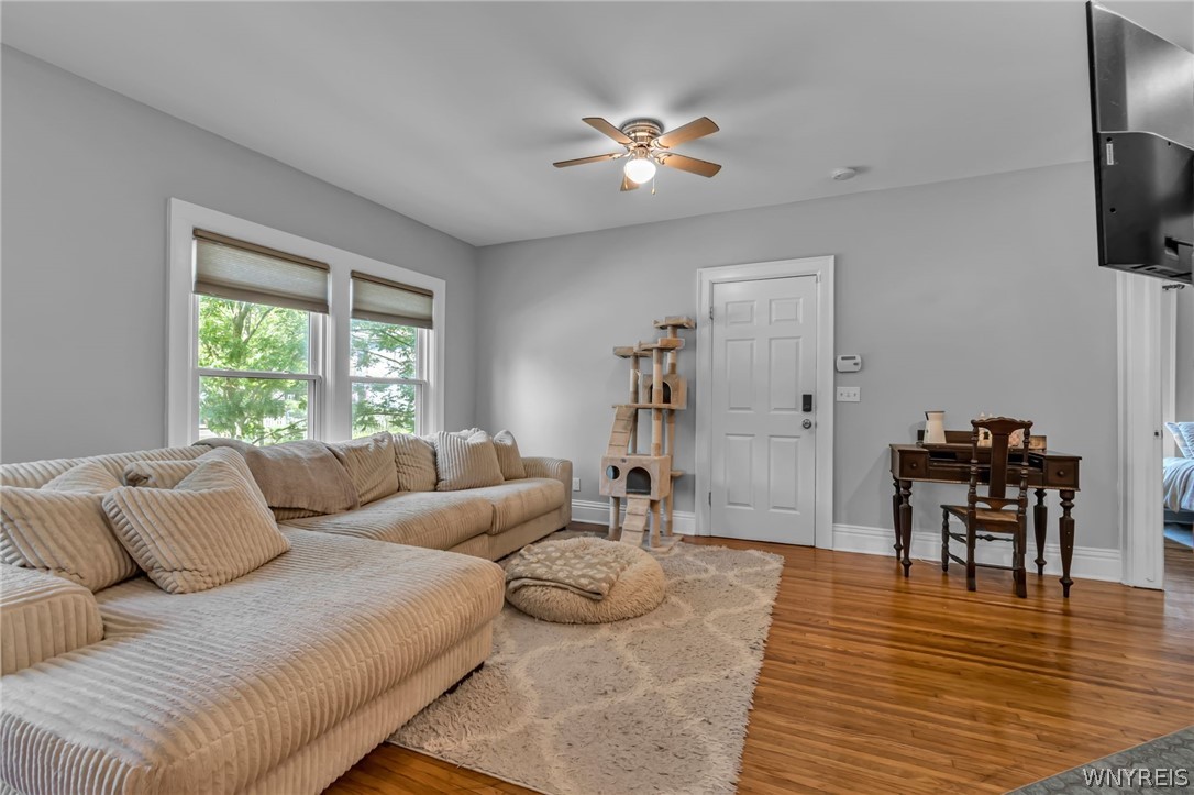 11 15th Street Buffalo, NY 14213 - Photo 6 of 35 Lower - family room, with door to primary BR at far right.