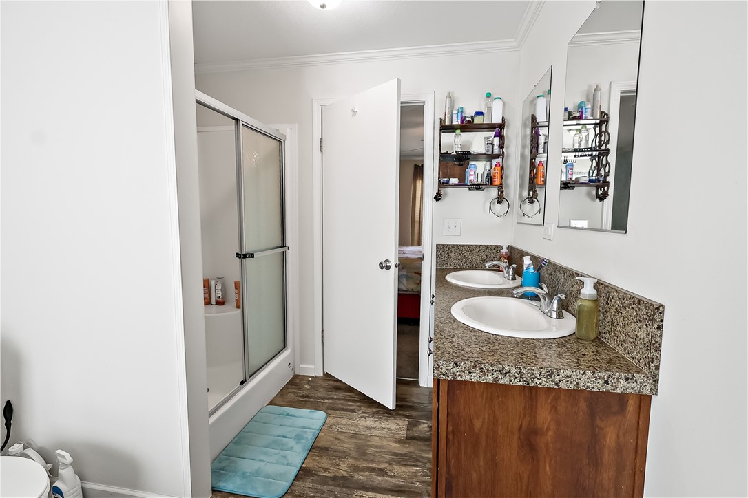 324 Valencia Street Sebastian, FL 32958 - Photo 16 of 21 a bathroom with a sink and a mirror