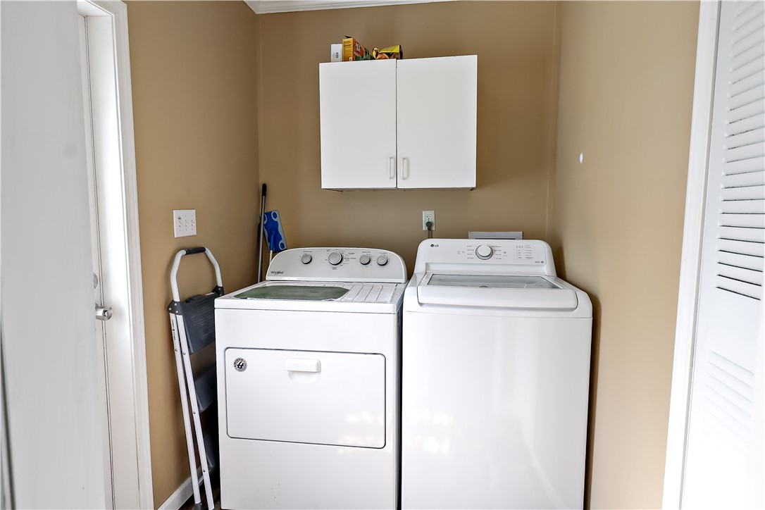324 Valencia Street Sebastian, FL 32958 - Photo 20 of 21 a utility room with dryer and washer
