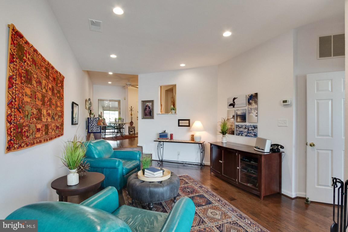 11184 Harbor Court Reston, VA 20191 - Photo 10 of 32 Open space highlighted by hardwood floors (2016)
