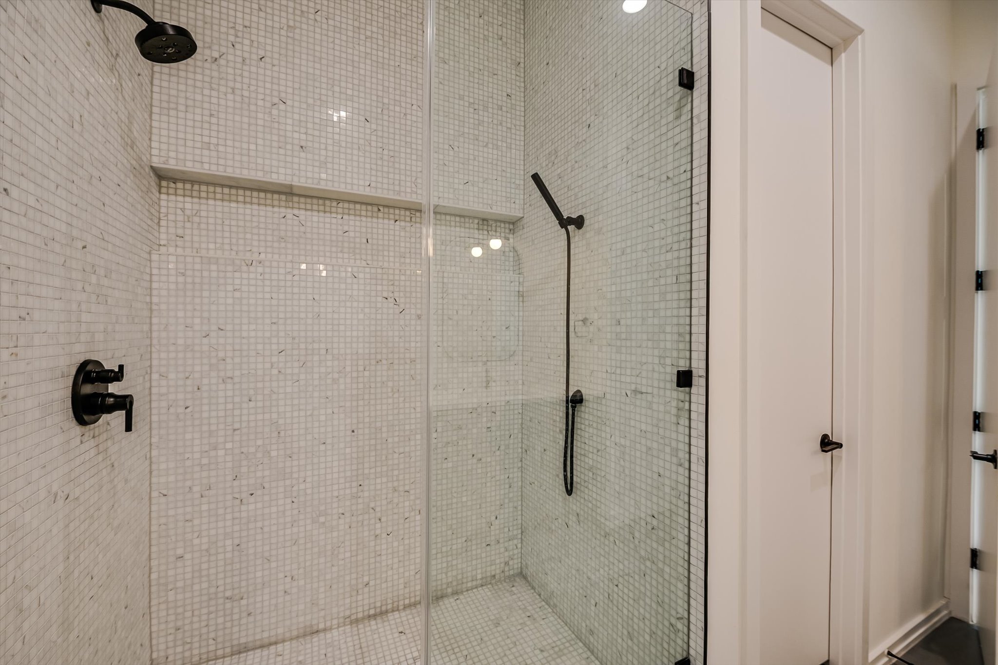 410 West Alpine Road, Unit 4 Austin, TX 78704 - Photo 13 of 24 a bathroom with a shower