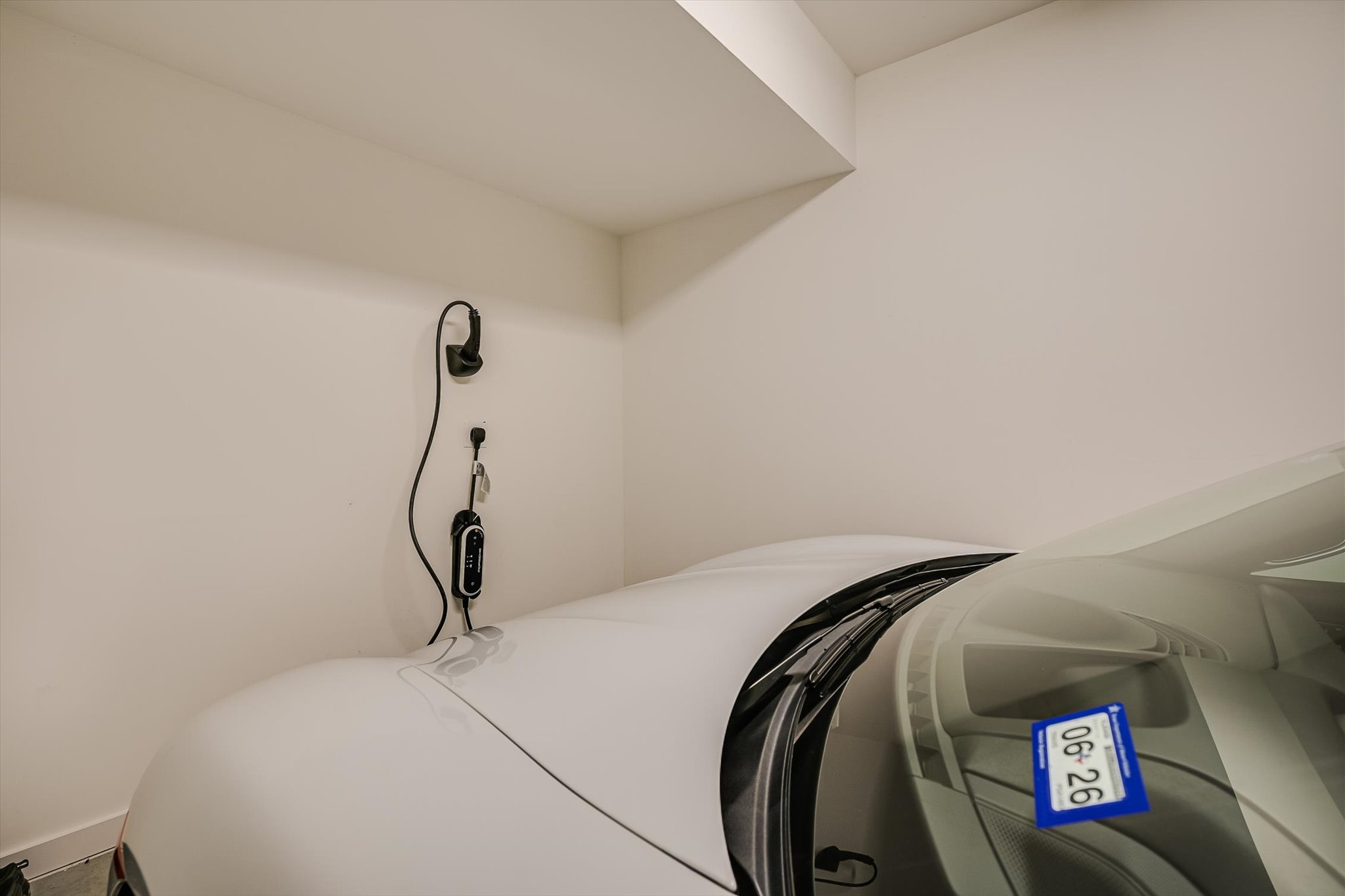 410 West Alpine Road, Unit 4 Austin, TX 78704 - Photo 20 of 24 a view of a room with water heater and wooden floor