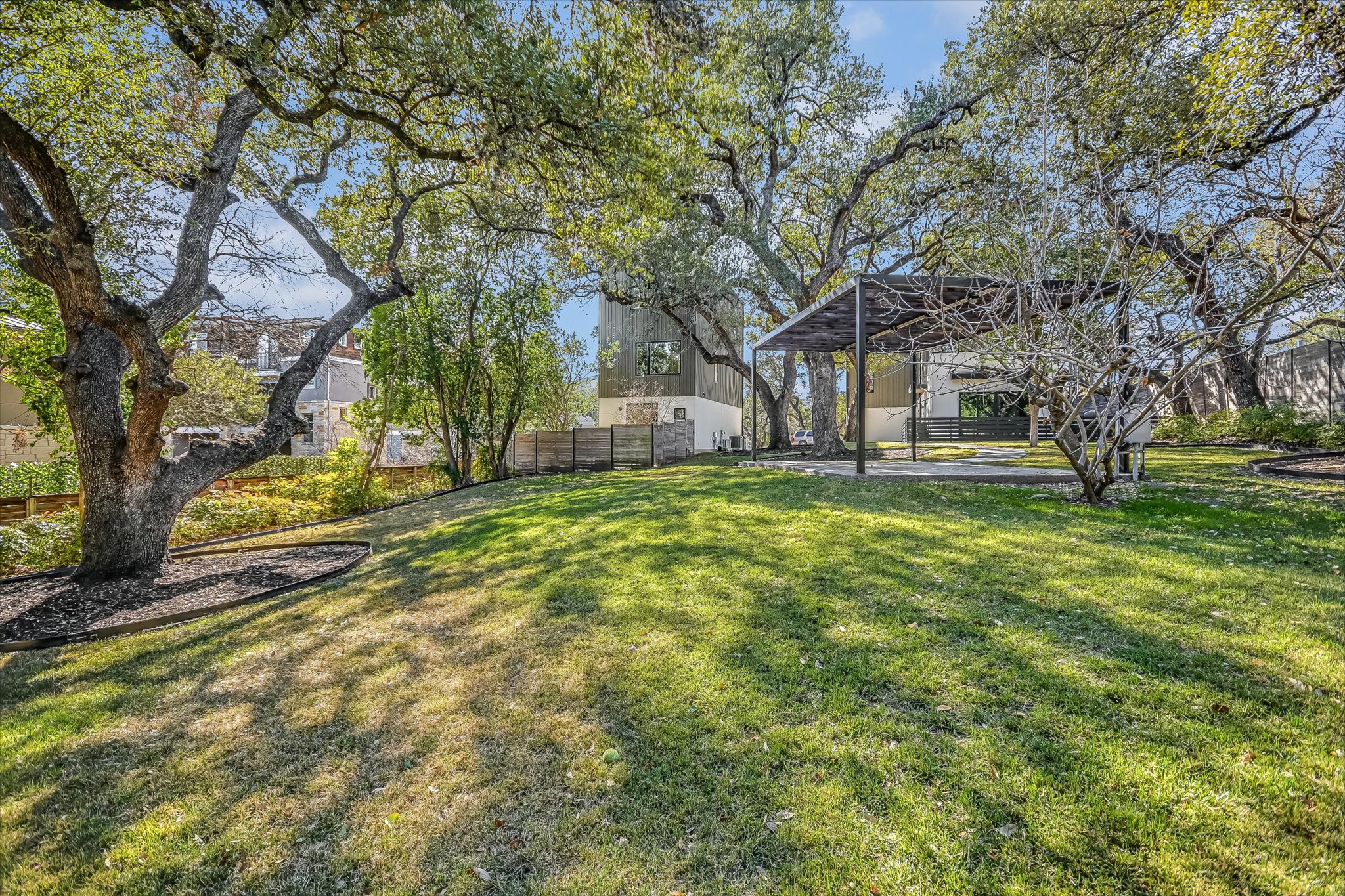 410 West Alpine Road, Unit 4 Austin, TX 78704 - Photo 24 of 24 a view of a yard with a tree