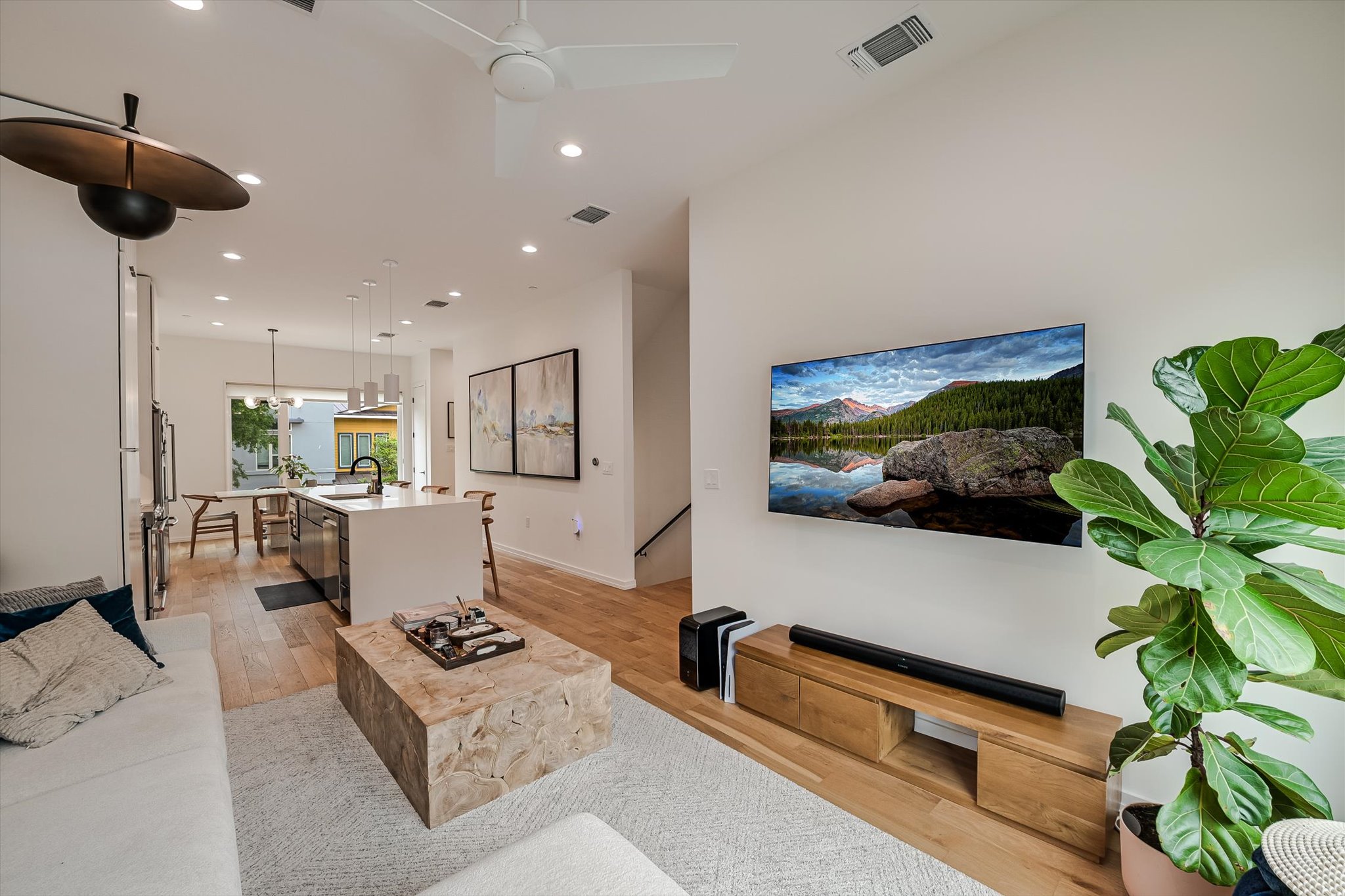 410 West Alpine Road, Unit 4 Austin, TX 78704 - Photo 5 of 24 a living room with furniture and a flat screen tv