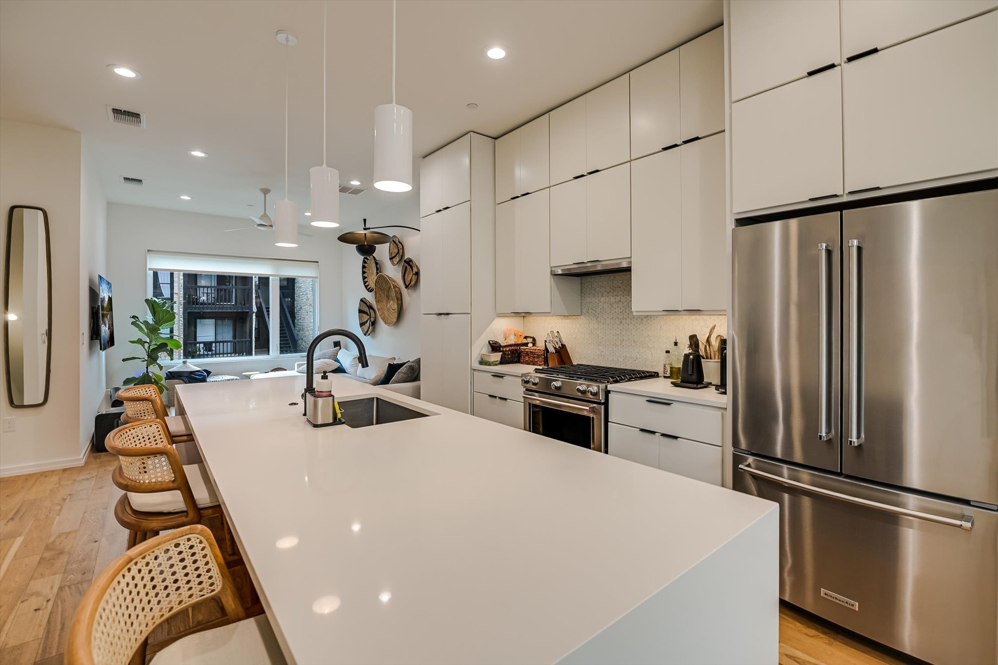 410 West Alpine Road, Unit 4 Austin, TX 78704 - Photo 7 of 24 a kitchen with sink a refrigerator and a stove top oven
