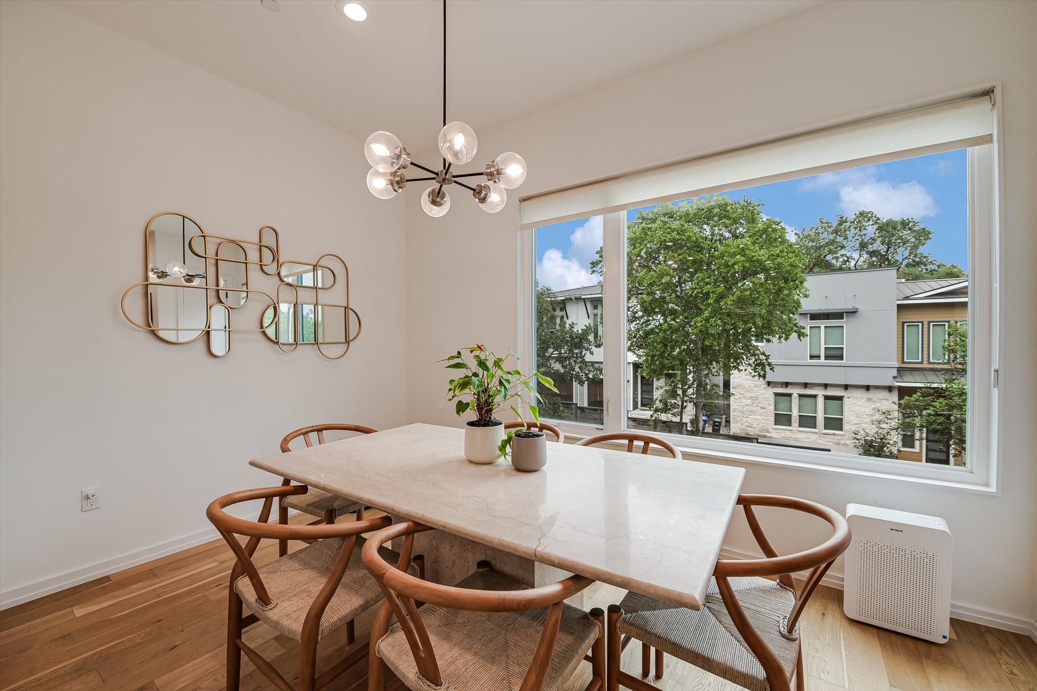410 West Alpine Road, Unit 4 Austin, TX 78704 - Photo 10 of 24 a view of a dining room with furniture window and outside view