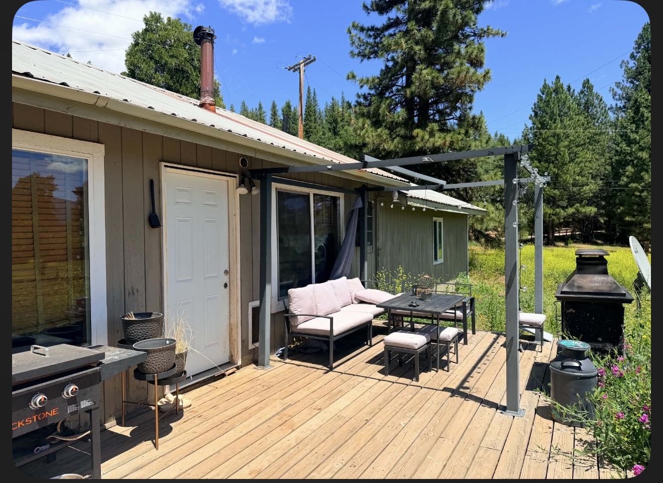 15440 Old Wagon Road Crescent Mills, CA 95934 - Photo 3 of 19 a view of sitting area with furniture and wooden floor