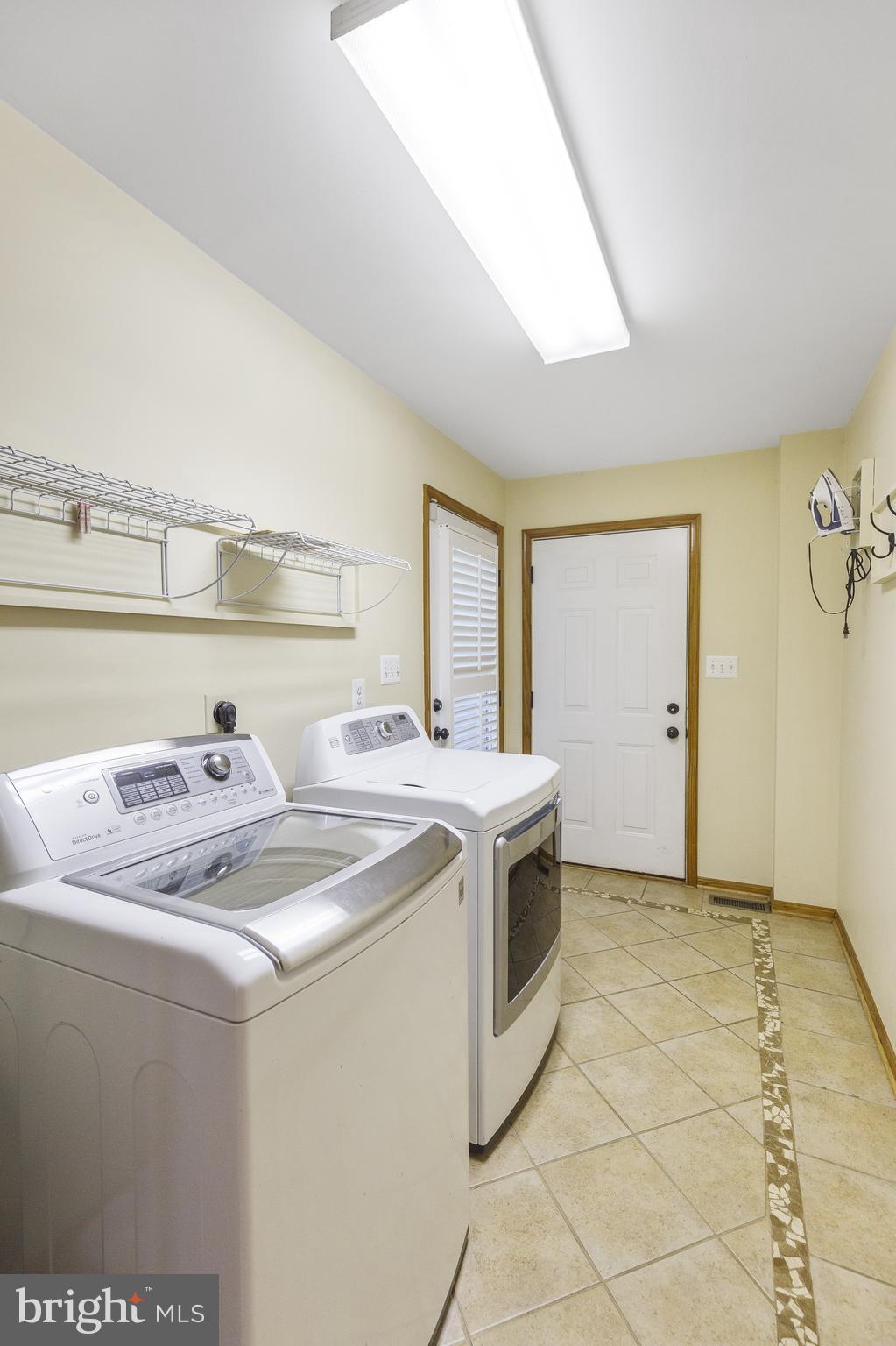 500 Plum Point Road Huntingtown, MD 20639 - Photo 12 of 30 Laundry room to garage. Beautiful tile.