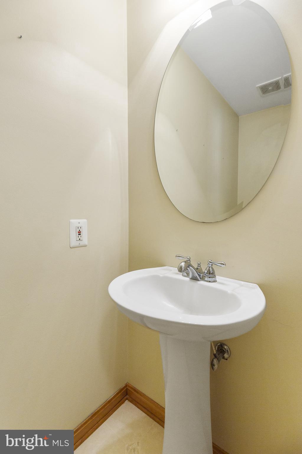 500 Plum Point Road Huntingtown, MD 20639 - Photo 14 of 30 Main level powder room