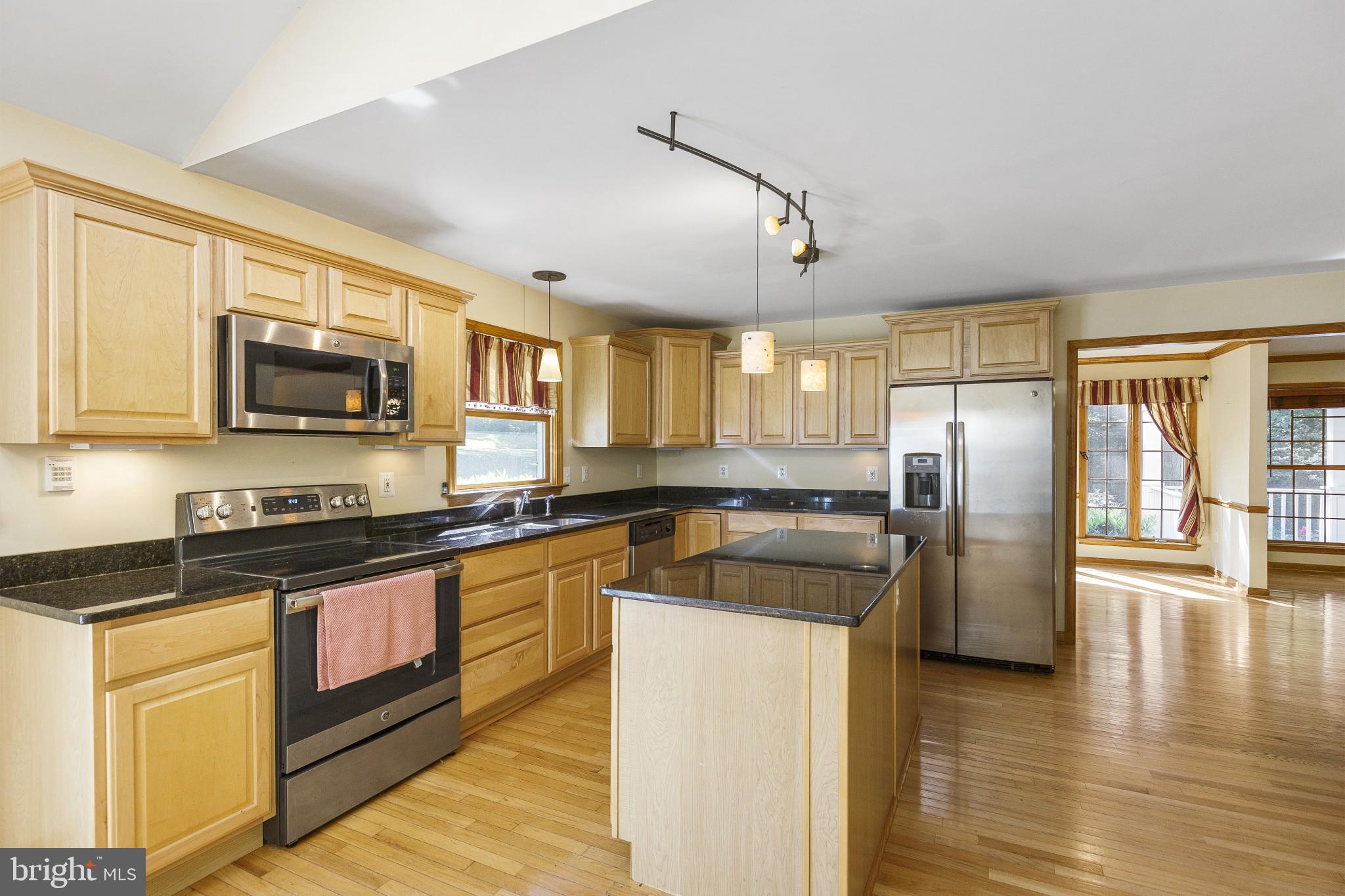 500 Plum Point Road Huntingtown, MD 20639 - Photo 9 of 30 Large open kitchen through to front of home.