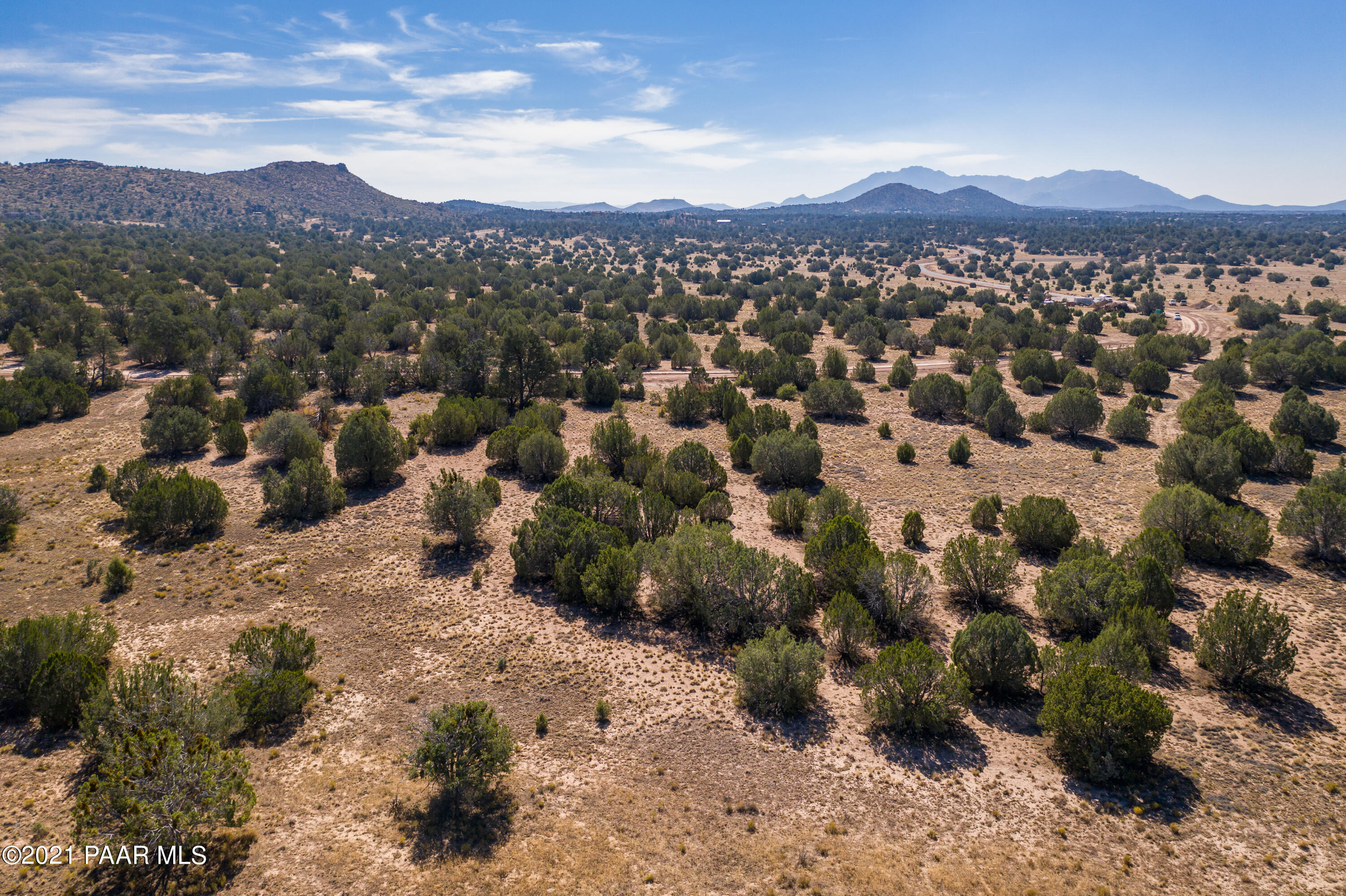4905 West Sterling Ranch Road Prescott, AZ 86305 - Photo 3 of 12 a view of a city with mountains in the background