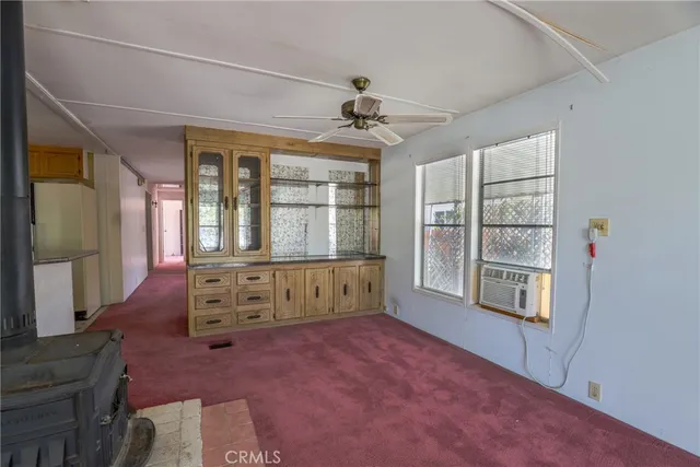 a kitchen with stainless steel appliances a refrigerator and a stove
