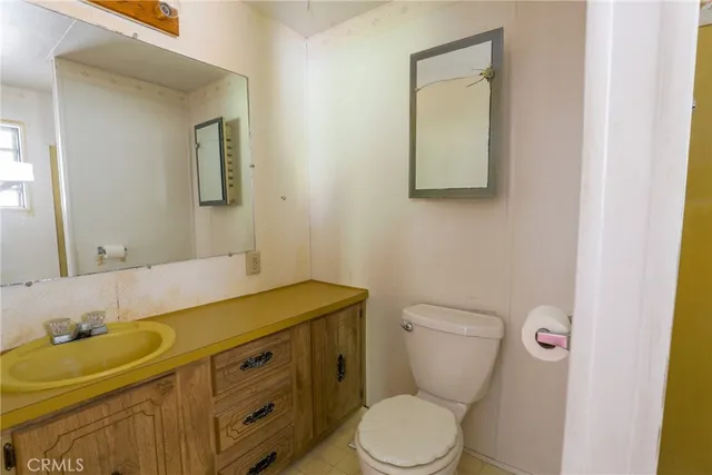 a view of a house with garden and plants