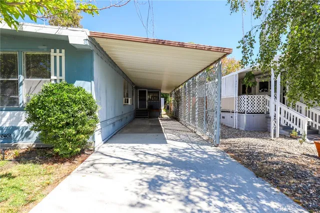 a view of a pathway with a glass door
