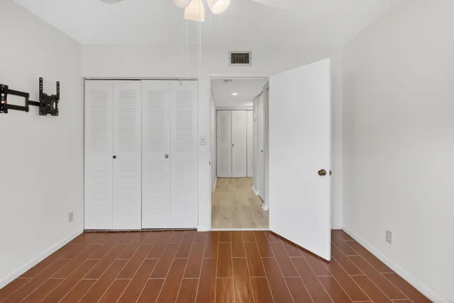 a view of a livingroom with wooden floor