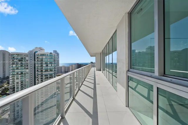 a view of a lake with a large building