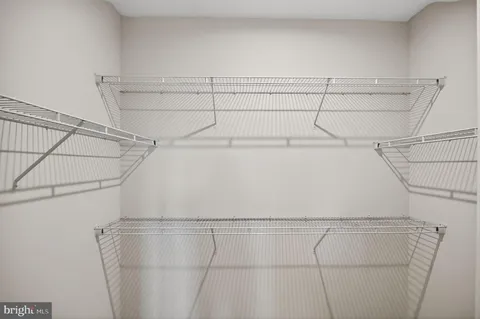 a view of a room with racks on the wall