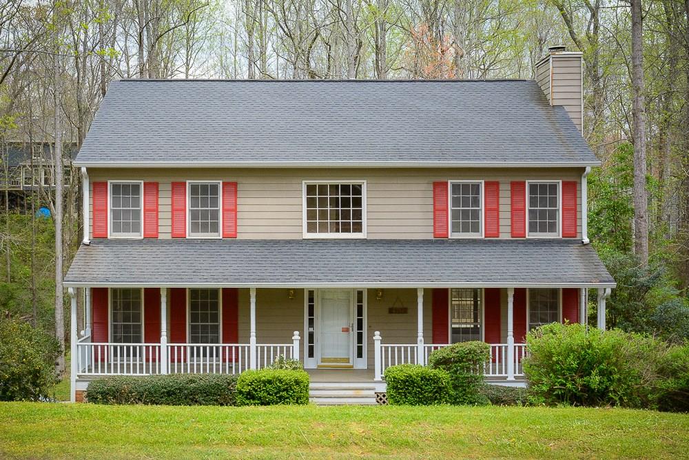 4568 Blakedale Road Roswell, GA 30075 - Photo 1 of 1 front view of a house with a yard