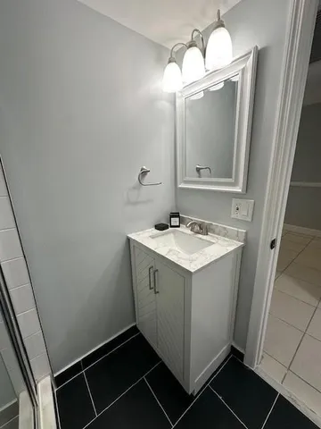 an empty room with mirror