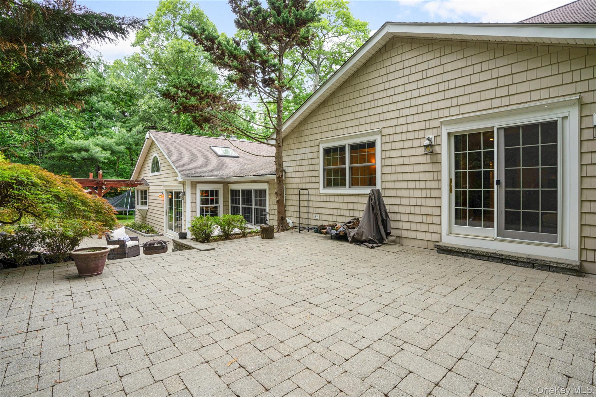 32 Country Road Mamaroneck, NY 10543 - Photo 29 of 35 Patio with doors to Primary Bedroom
