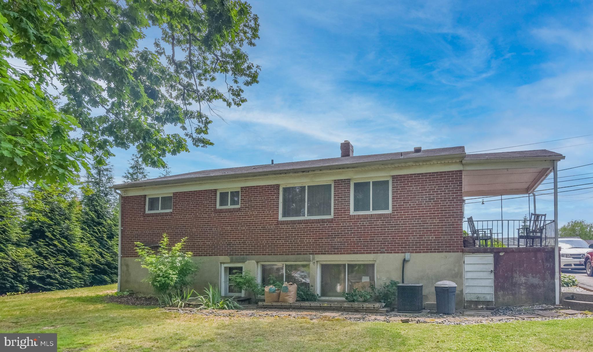 4428 Forge Road Perry Hall, MD 21128 - Photo 23 of 27 a front view of a house with garden
