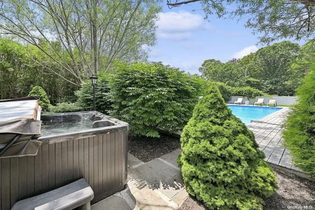a view of a backyard with plants