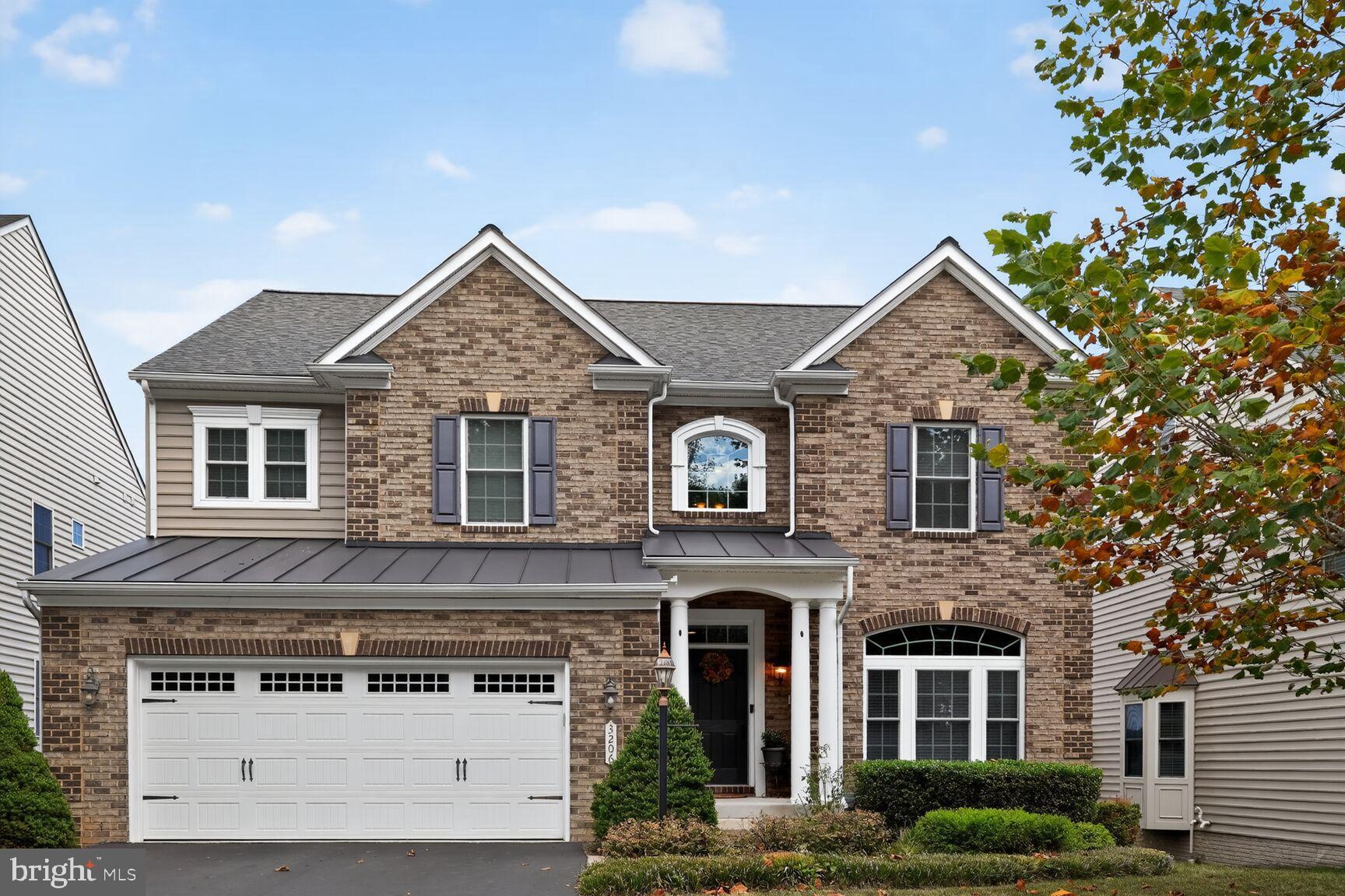 3206 Hatcher Street Alexandria, VA 22303 - Photo 1 of 49 a view of a big house with a tree and front view of a house