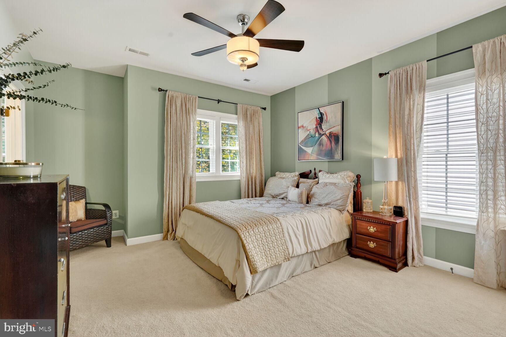 3206 Hatcher Street Alexandria, VA 22303 - Photo 27 of 49 a bedroom with a bed dresser and a window