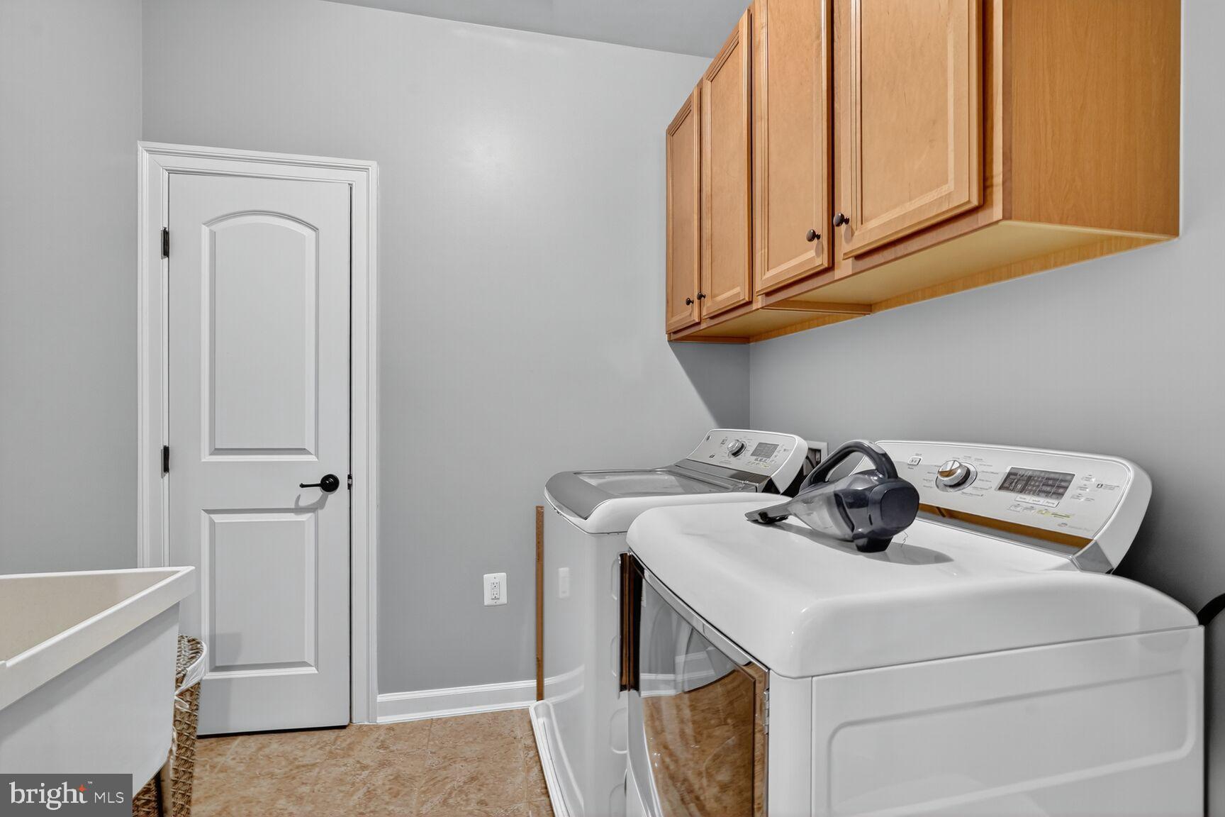 3206 Hatcher Street Alexandria, VA 22303 - Photo 29 of 49 a utility room with dryer and washer