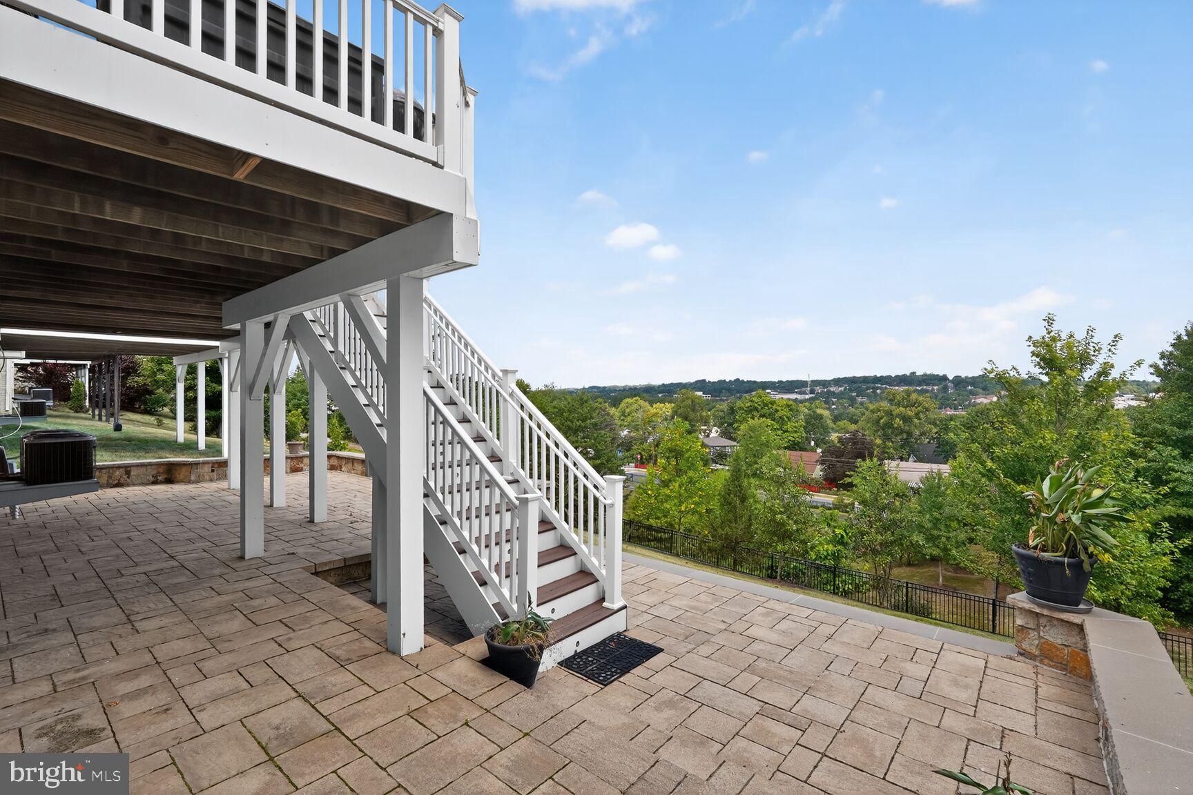 3206 Hatcher Street Alexandria, VA 22303 - Photo 45 of 49 a view of a chair and tables in the balcony