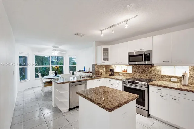 a bedroom with a bed and a cabinets
