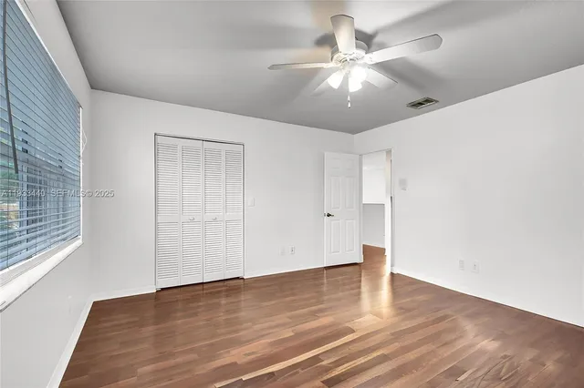 a view of a patio with couches table and chairs