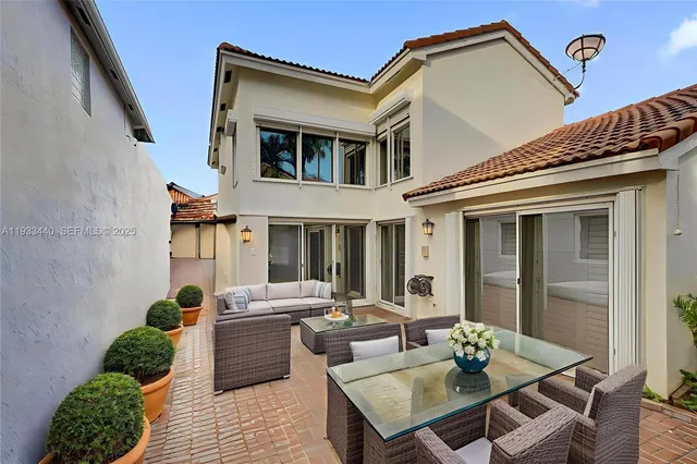 a bathroom with a sink a mirror and a shower