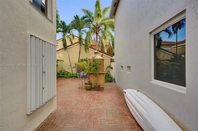 a view of swimming pool with a yard and lake view