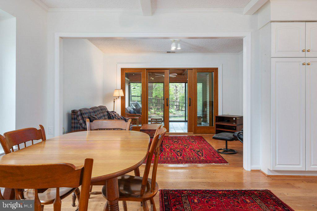 846 Woodmont Road Annapolis, MD 21401 - Photo 11 of 34 Kitchen, Family Area and 3-Season Porch